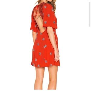 Red free people dress. Mini, backless with lace details. Size 0